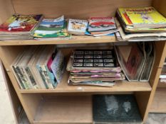 A collection of Giles Cartoons annuals together with magazines, 45 records,