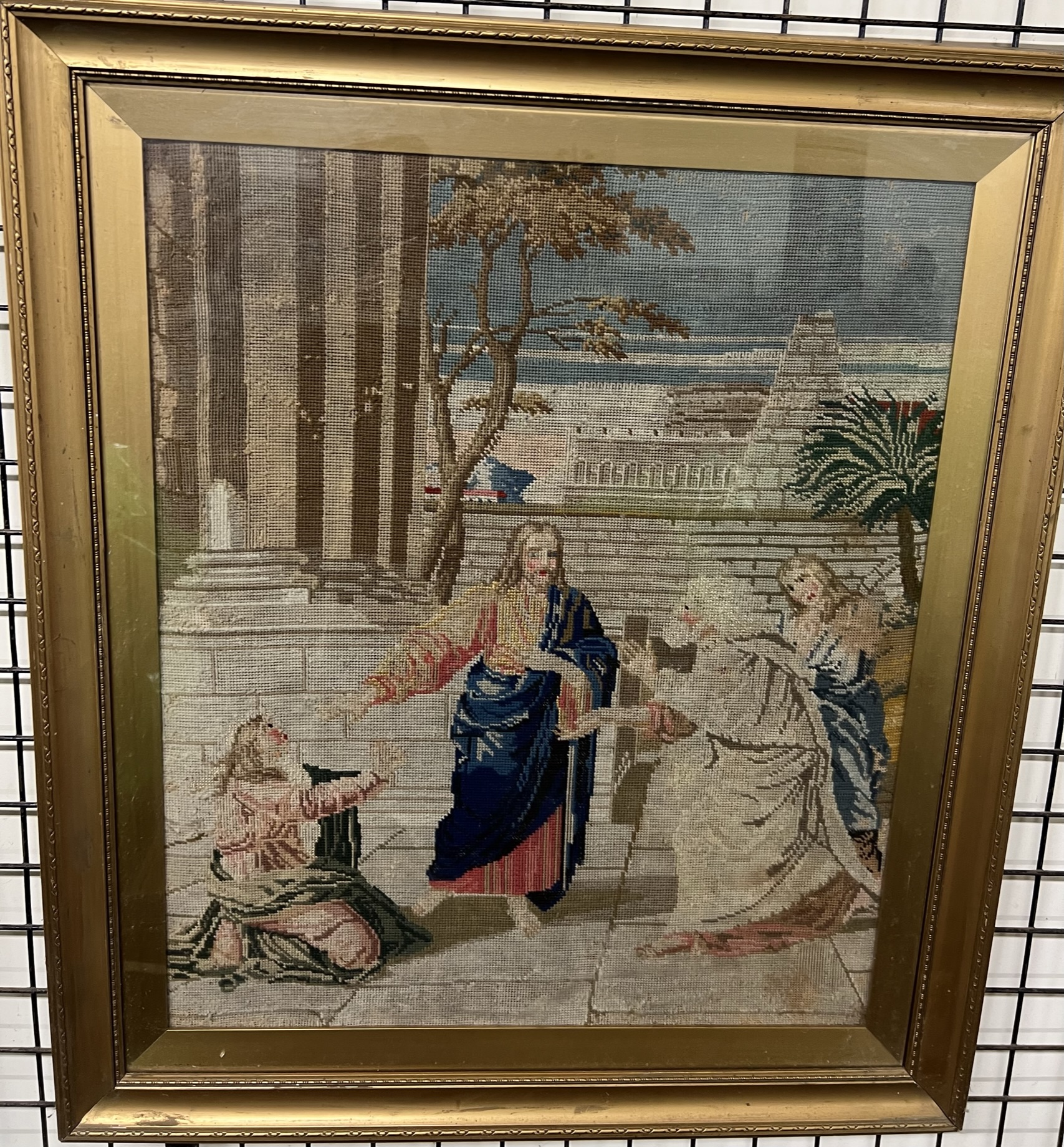 A 19th century woolwork picture of a religious scene,