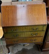 A 20th century mahogany bureau,