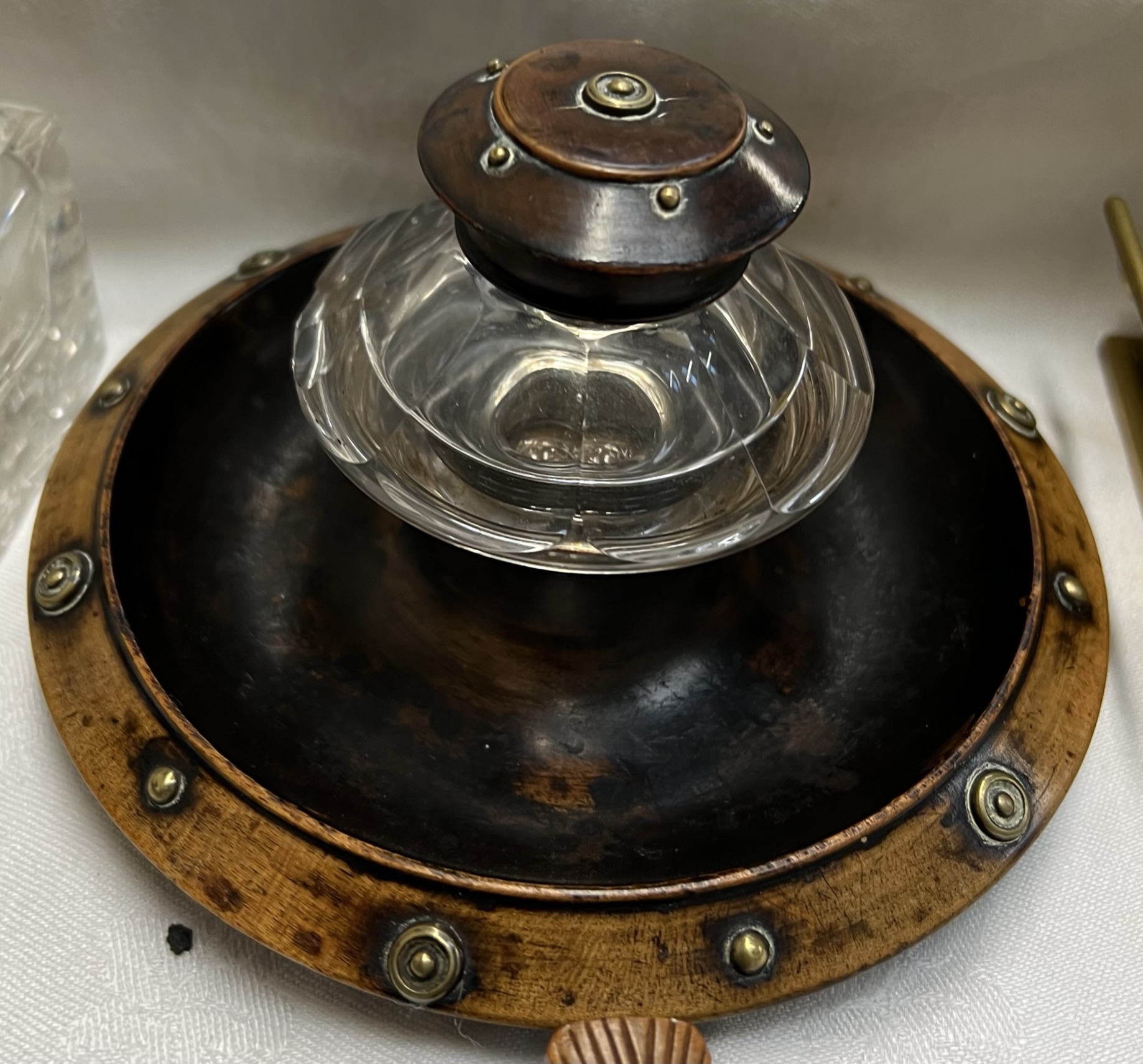 A brass and glass desk inkwell together with two other inkwells and a treen nut cracker - Image 3 of 4