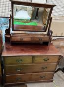 An Edwardian mahogany dressing chest with a rectangular mirror plate and two drawers,