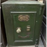 A Richard M Lord fire resisting safe, with brass rotating handle, with sing drawer to the interior,