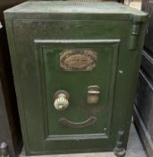 A Richard M Lord fire resisting safe, with brass rotating handle, with sing drawer to the interior,