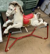 A MOBO toys sprung rocking horse