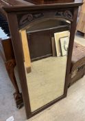 A Victorian dressing table mirror converted to a wall mirror