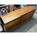 Two mid-20th century teak chests of drawers with cream sides one cabinet is 61cm wide,