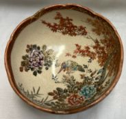 A Japanese Satsuma pottery bowl, decorated with birds and flowers, signed, 9.