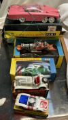 A collection of model vehicles including a Schuco Mercedes TYP SSK micro racer,