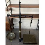 A G Williamson & Co beam scales to weigh 30lb, with a cast iron shaped base with lions paw feet,