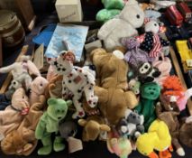 A collection of Ty beanie babies and other toys