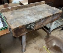 A work bench fitted with a vice