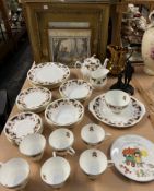 A Duchess Westminster pattern part tea set together with a copper lustre jug, a carved coal figure,