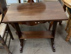 A 20th century oak side table with a rectangular top and a shelf on slab sides
