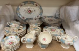 A Myott Son & Co Ltd part tea and dinner service decorated with roses and other garden flowers