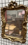 A small gilt framed wall mirror