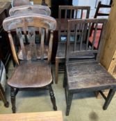 A pair of slat back kitchen chairs together with another pair of kitchen chairs