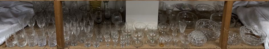 A large quantity of drinking glasses, glass decanters, glass bowls,