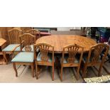 A modern pine extending dining table and six chairs