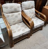 A pair of upholstered conservatory chairs