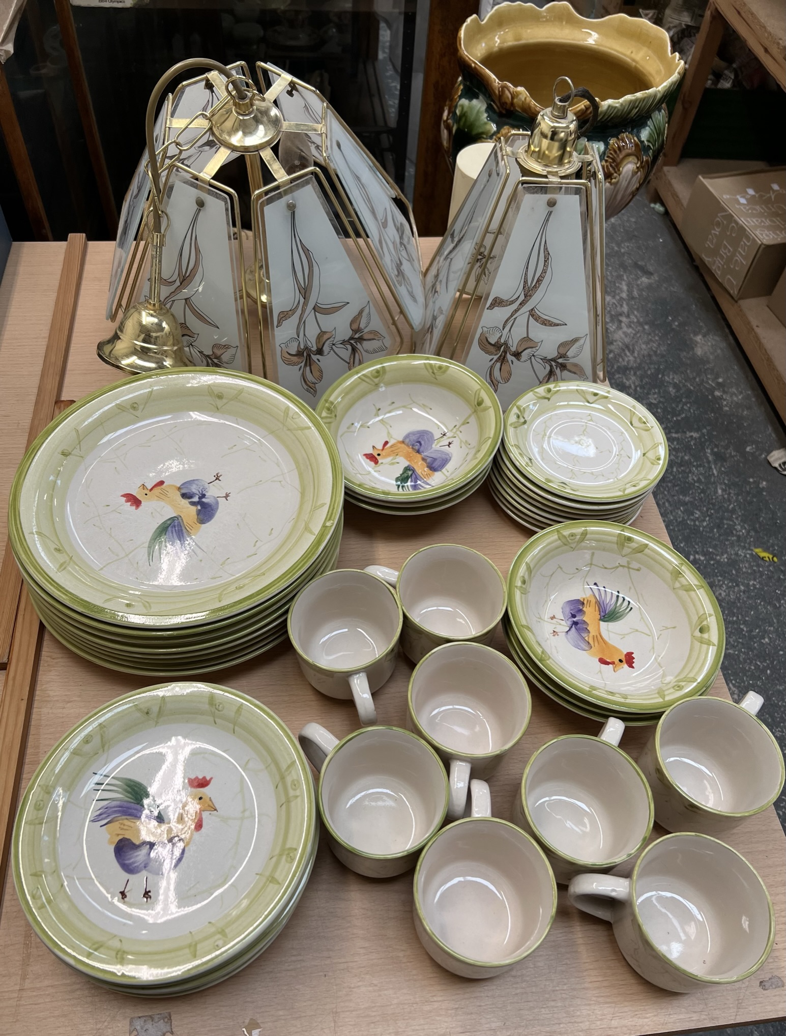 A Scotts of Stow part dinner service decorated with cockerels together with glass ceiling lights