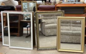 A gilt framed wall mirror together with four other wall mirrors