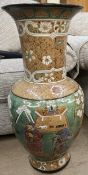 A large Japanese pottery floor vase decorated with figures and trees,