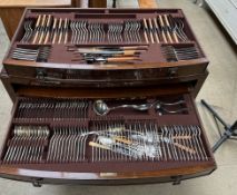 An extensive James Dixon and Sons electroplated flatware service contained in a two drawer walnut