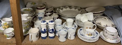 A Royal Albert Tea Rose pattern part tea service together with Wedgwood coffee cans,