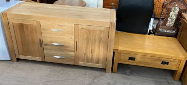 A Modern oak sideboard with two cupboards and three drawers together with a coffee table