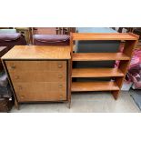 A mid 20th century teak chest with four long drawers on square tapering legs together with a