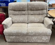 An upholstered two seater settee,