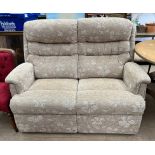 An upholstered two seater settee,