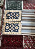 A green ground Turkoman prayer mat together with a red ground prayer rug,