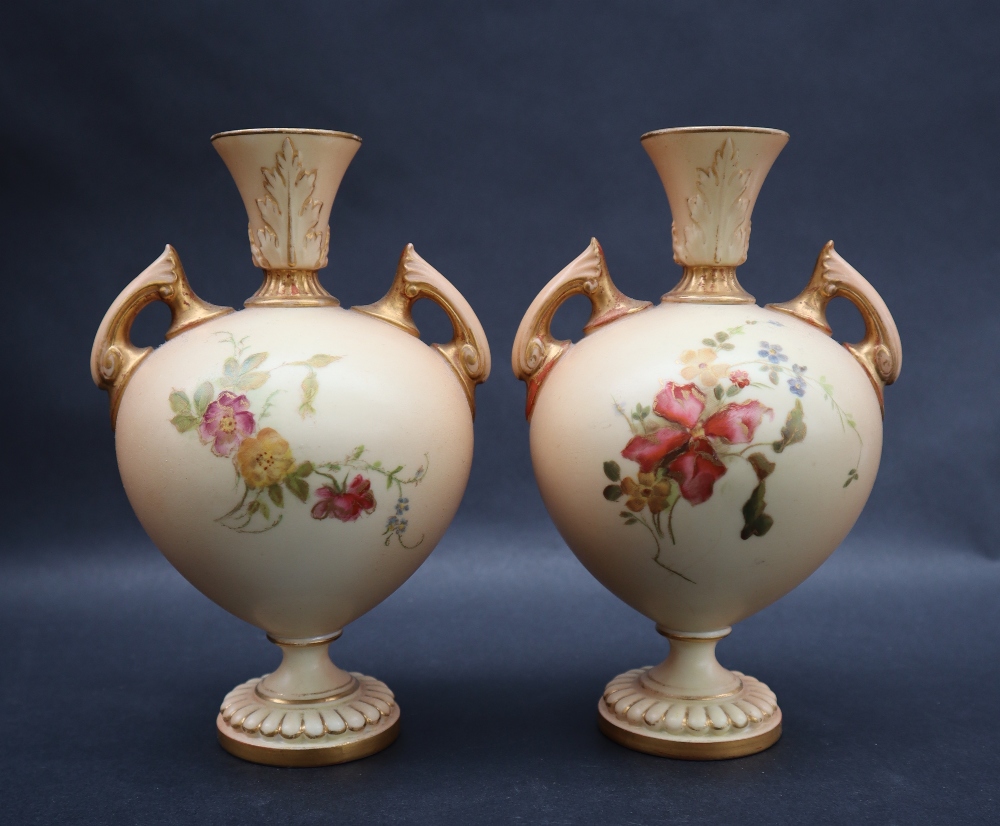 A pair of Royal Worcester porcelain twin handled vases transfer and infill decorated with flowers - Image 4 of 5