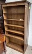 A pair of modern oak bookcases