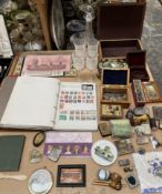 Two stamp albums together with assorted coins and medallions, bangles,