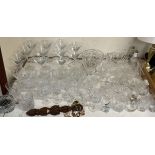 Assorted drinking glasses together with glass bowls,