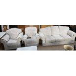 An upholstered three piece suite,