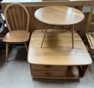 An Ercol light elm coffee table of square form,