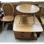 An Ercol light elm coffee table of square form,