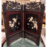 A Japanese lacquer screen with carved cresting and bone inlaid panels depicting birds ,