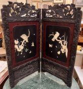 A Japanese lacquer screen with carved cresting and bone inlaid panels depicting birds ,