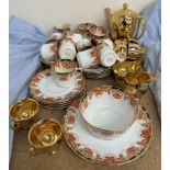 A Royal Winton gilt decorated part tea set together with a Royal Albert part tea set