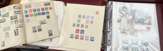 A collection of First Day Lithographs together with stamp albums