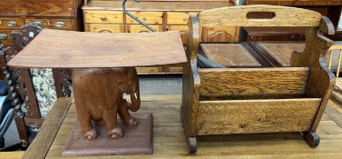 A stool with a dished top on an elephant base together with an oak magazine rack