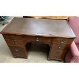 An early 20th century mahogany pedestal desk,