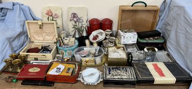 Assorted tins together with pen knives, brass egg cups, electroplated candlesticks,