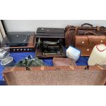 A Singer sewing machine together with a record player, leather bags, trunks,
