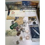 A collection of coins including a Victorian crown, cartwheel penny,