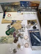 A collection of coins including a Victorian crown, cartwheel penny,